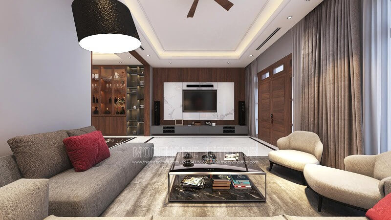 Đá trắng vân mây kết hợp gỗ ốp tường vân óc chó cao cấp tạo nên vẻ đẹp sang trọng đầy lôi cuốn cho phòng khách hiện đại. Thiết kế nội thất phòng khách biệt thự